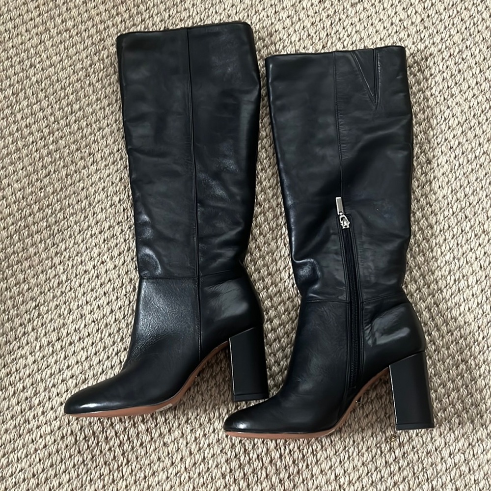 Schutz, black fur-lined mid calf black leather boots. Never worn